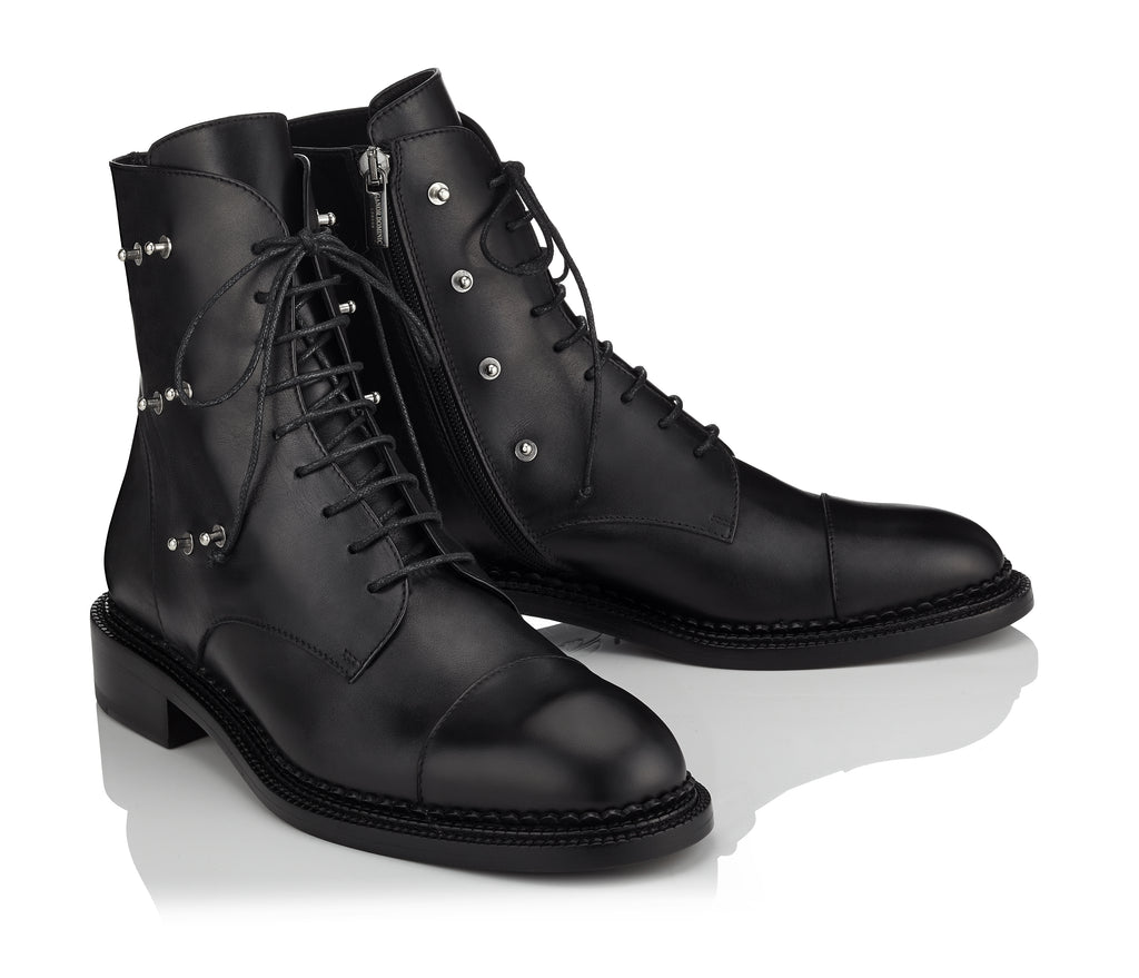Fashion women's black boots with a face