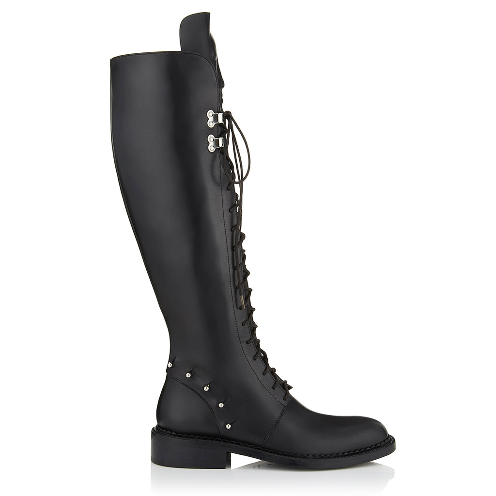 Black women’s lace up boots  by the brand Ganor Dominic